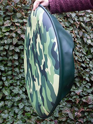Camouflage wheelcover with a green skirt.