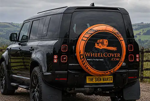 Full Wrap Wheel Cover on Black Defender